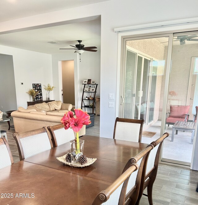 4956 S Leisure Way, Gilbert, AZ 85298 - dining room featuring a ceiling fan and wood finished floors