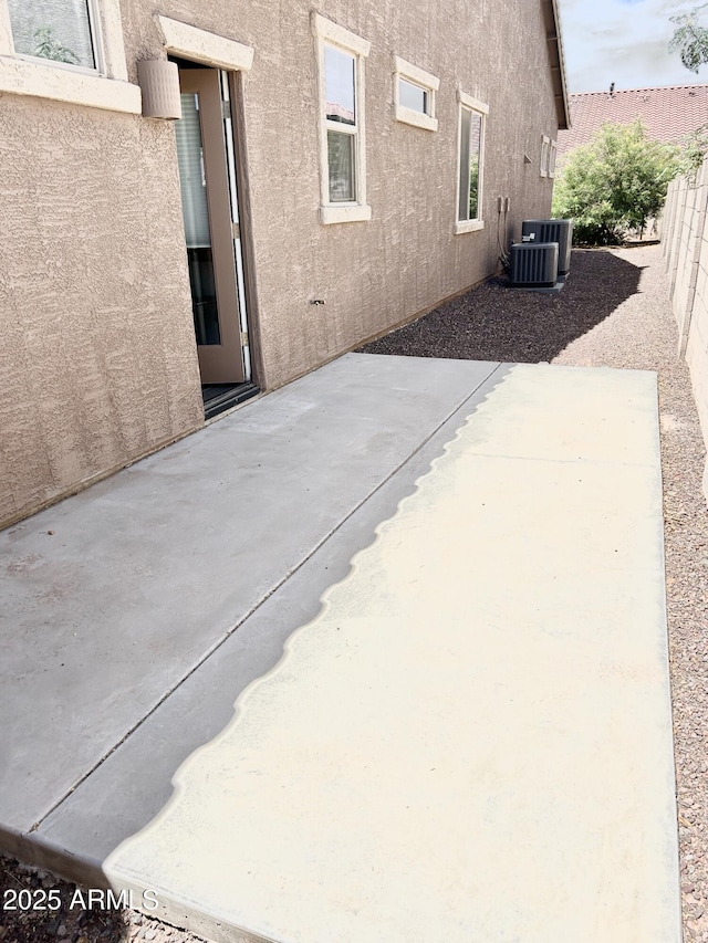 4956 S Leisure Way, Gilbert, AZ 85298 - view of patio / terrace featuring central air condition unit