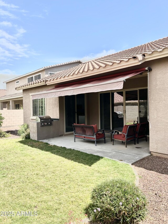 4956 S Leisure Way, Gilbert, AZ 85298 - rear view of property with a patio, a tiled roof, and stucco siding