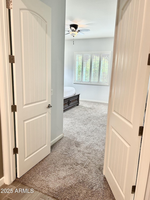 4956 S Leisure Way, Gilbert, AZ 85298 - unfurnished bedroom with carpet, baseboards, and ceiling fan