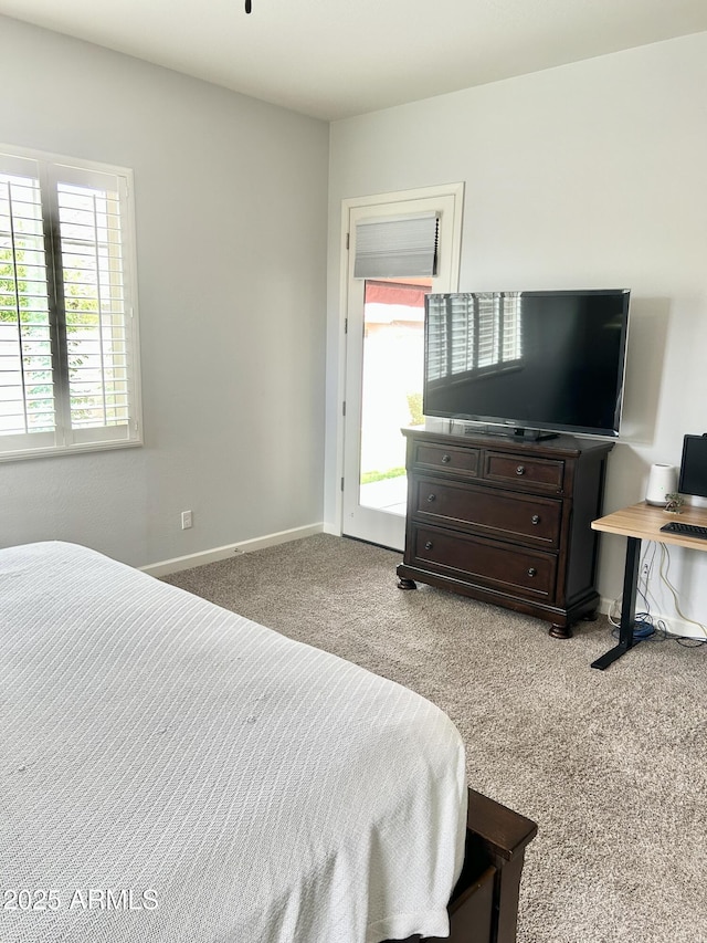 4956 S Leisure Way, Gilbert, AZ 85298 - bedroom with multiple windows, carpet flooring, and baseboards