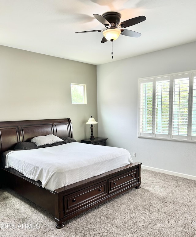 4956 S Leisure Way, Gilbert, AZ 85298 - bedroom featuring light colored carpet, baseboards, and ceiling fan