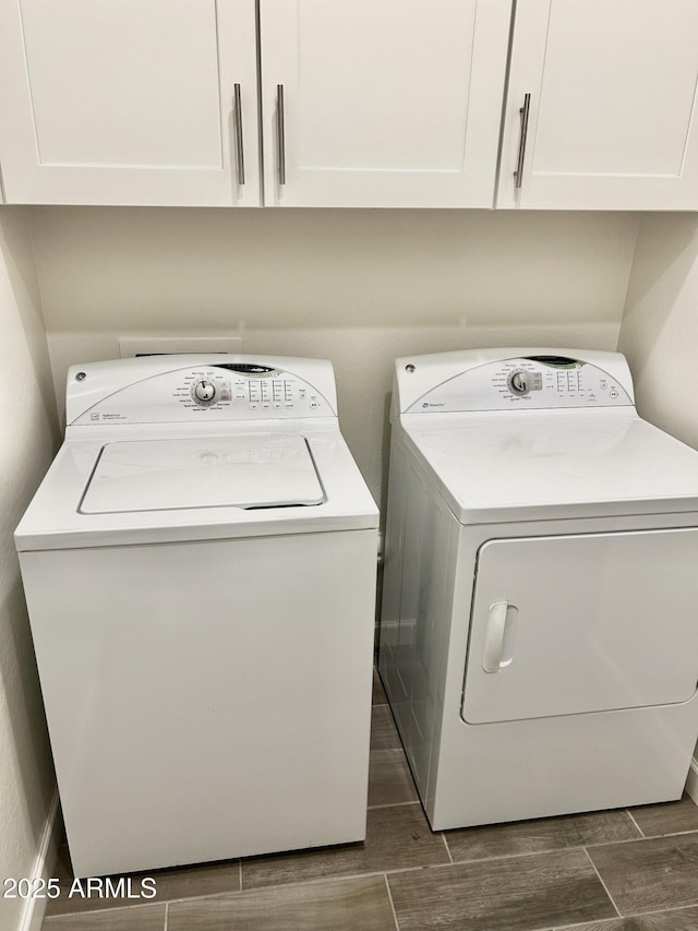 4956 S Leisure Way, Gilbert, AZ 85298 - laundry room featuring washer and clothes dryer, cabinet space, and wood finish floors