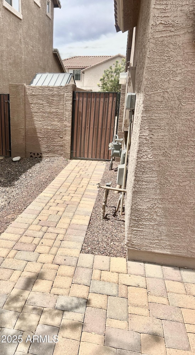 4956 S Leisure Way, Gilbert, AZ 85298 - view of patio featuring a gate