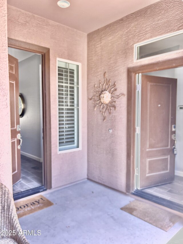 4956 S Leisure Way, Gilbert, AZ 85298 - doorway to property featuring stucco siding