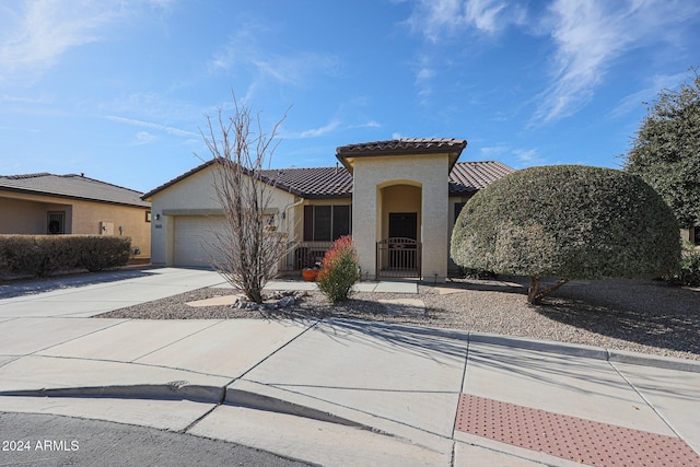 view of front of home with a garage