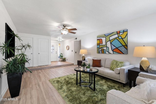 2804 N Nebraska St, Chandler, AZ 85225 - living area with a ceiling fan, wood finished floors, and baseboards
