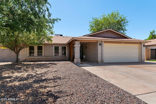 2804 N Nebraska St, Chandler, AZ 85225 - ranch-style house with brick siding, driveway, and a garage