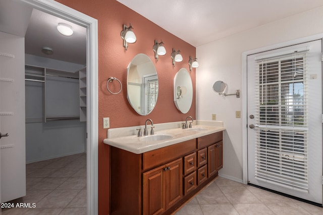 bathroom featuring vanity and tile patterned flooring