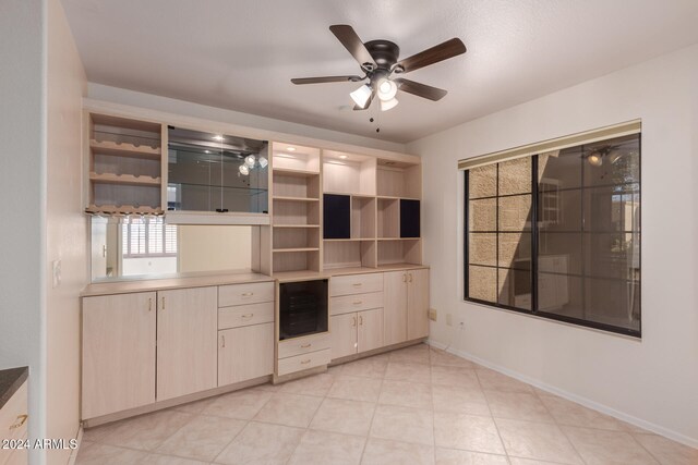 kitchen with wine cooler and ceiling fan