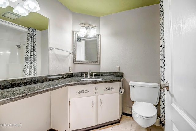 bathroom featuring tile patterned flooring, curtained shower, toilet, and vanity