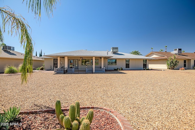 view of front of house featuring cooling unit