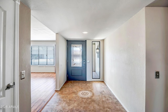 entrance foyer featuring baseboards