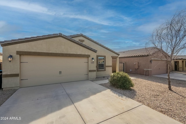 view of front of home with a garage