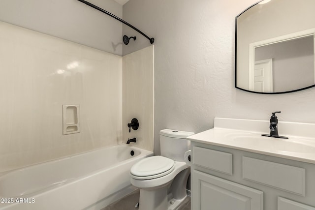 full bathroom featuring vanity, bathtub / shower combination, and toilet