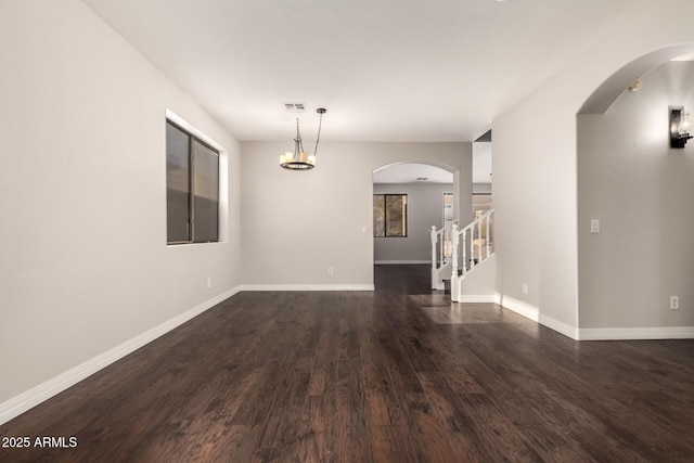 unfurnished room featuring dark hardwood / wood-style floors