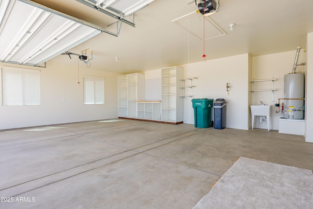 garage with a garage door opener and gas water heater