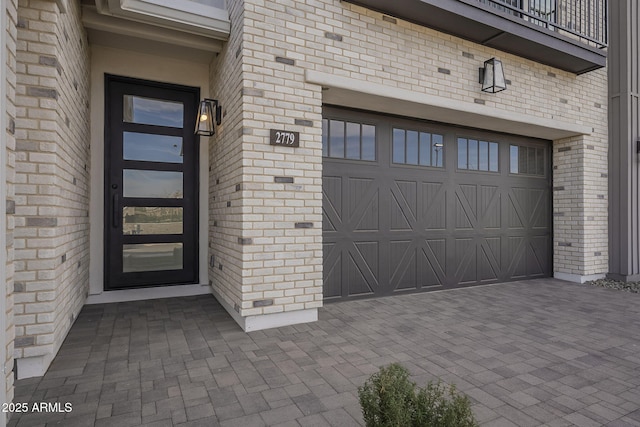 property entrance featuring a garage