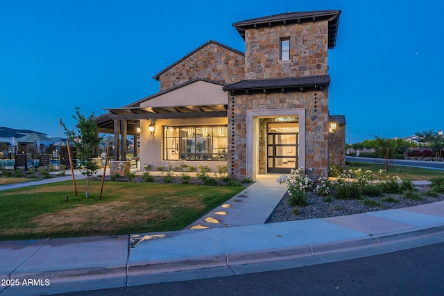 view of front of house with a front lawn