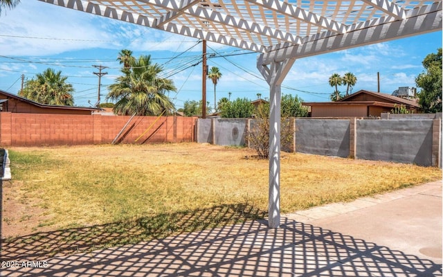 view of yard featuring a patio and a pergola