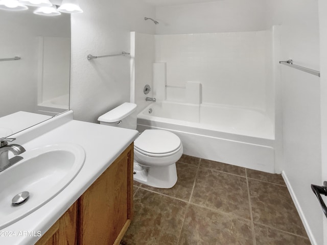 full bathroom featuring toilet, vanity, bathing tub / shower combination, and tile patterned floors