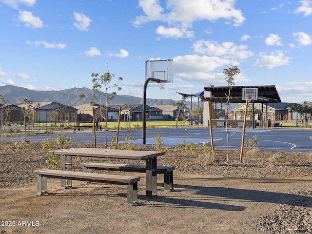 view of basketball court featuring community basketball court and a mountain view