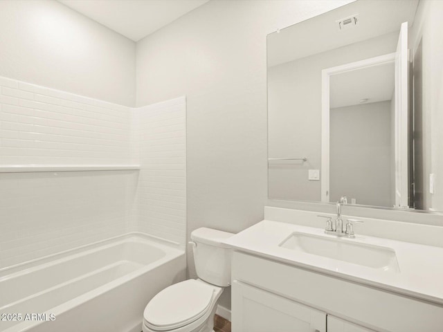 bathroom featuring visible vents, tub / shower combination, vanity, and toilet