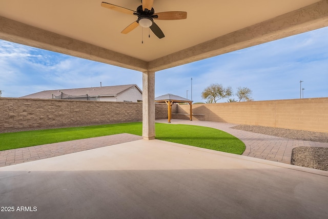 view of patio featuring a gazebo and ceiling fan