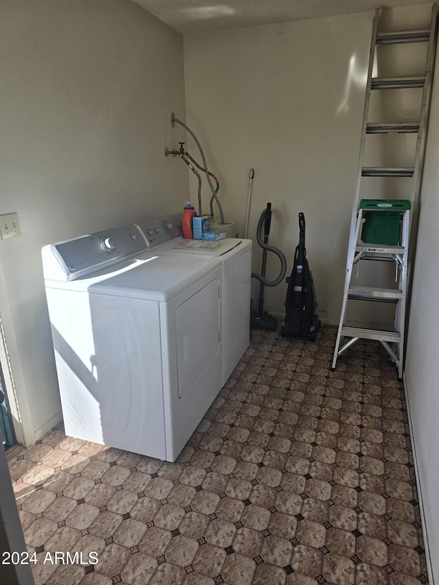 laundry area featuring independent washer and dryer