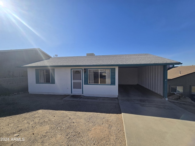 view of front of house with a carport