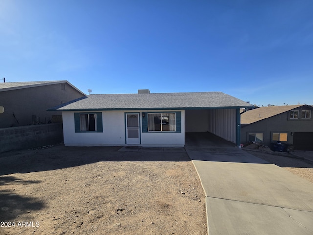 view of front facade featuring a carport