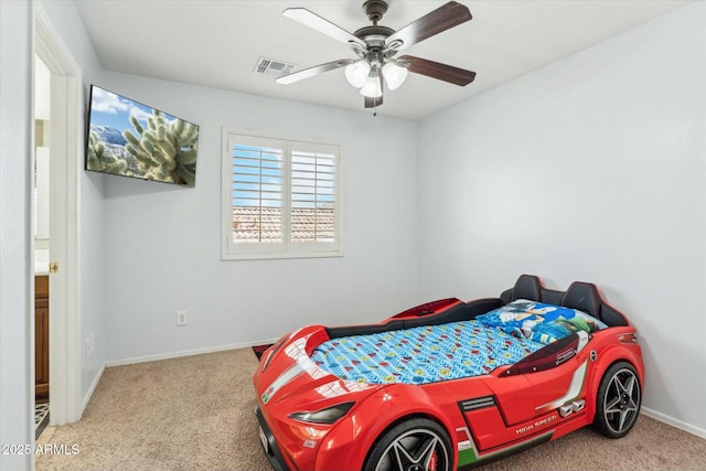 bedroom with carpet floors, a ceiling fan, visible vents, and baseboards