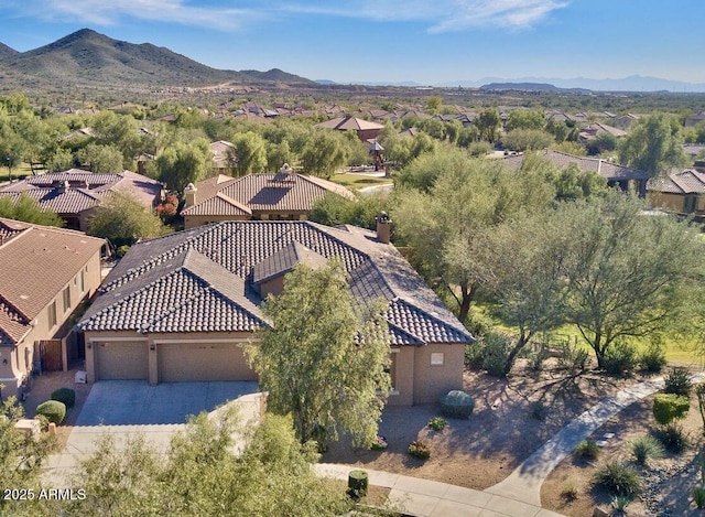 drone / aerial view featuring a mountain view