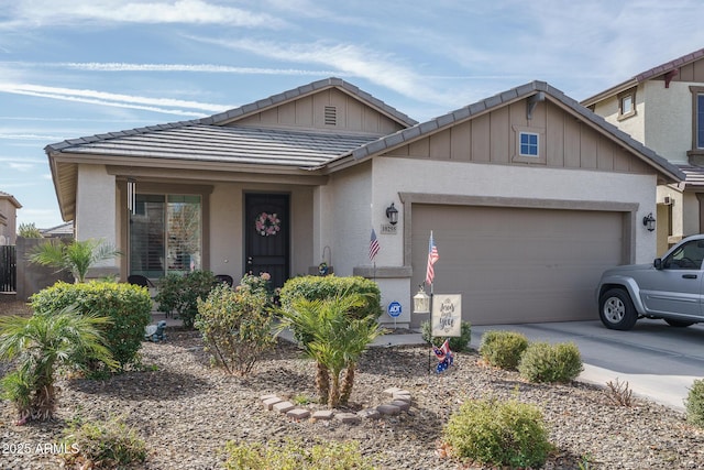 view of front facade featuring a garage and covered porch