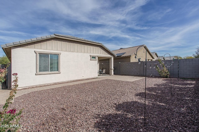 rear view of property with a patio