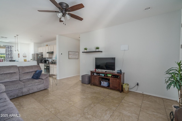 living room with ceiling fan