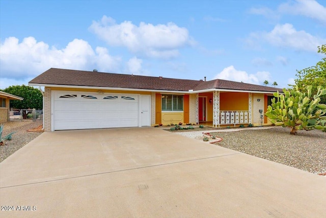 ranch-style house featuring a garage