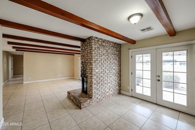 interior space featuring light tile patterned floors, visible vents, baseboards, french doors, and beamed ceiling