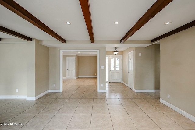 entryway featuring recessed lighting, beam ceiling, and light tile patterned flooring