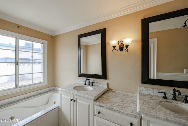 full bath with crown molding, two vanities, a sink, and a water view