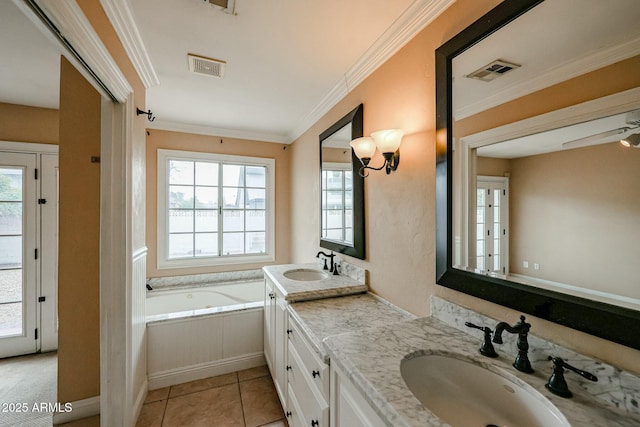 full bathroom featuring ornamental molding, a sink, and visible vents