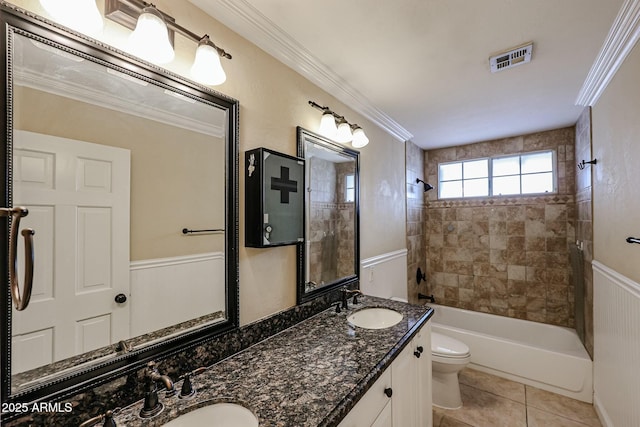 full bathroom featuring visible vents, shower / bathing tub combination, ornamental molding, a sink, and tile patterned flooring