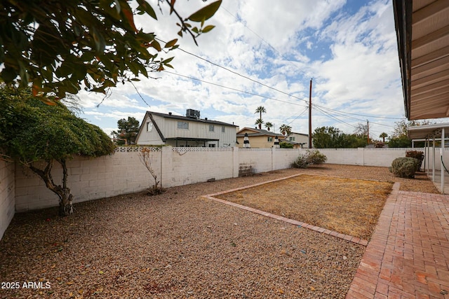 view of yard featuring a fenced backyard