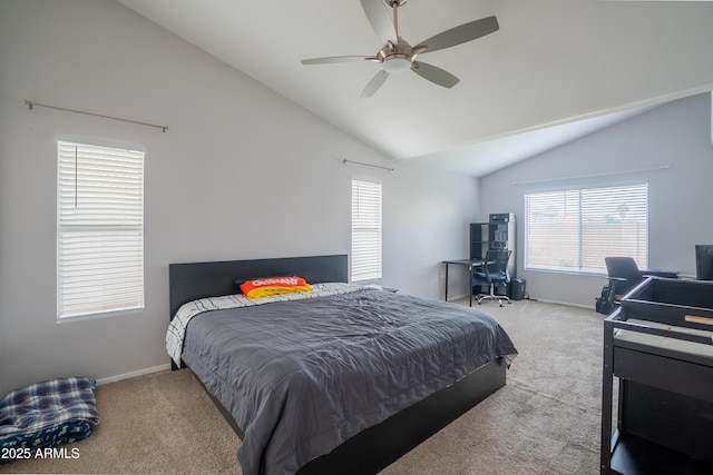 bedroom featuring multiple windows, lofted ceiling, and carpet