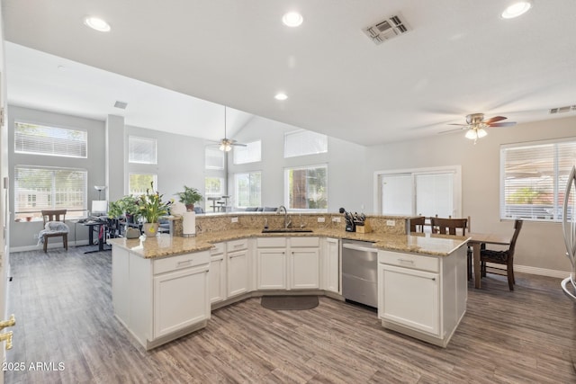 kitchen with a sink, visible vents, a ceiling fan, and dishwasher
