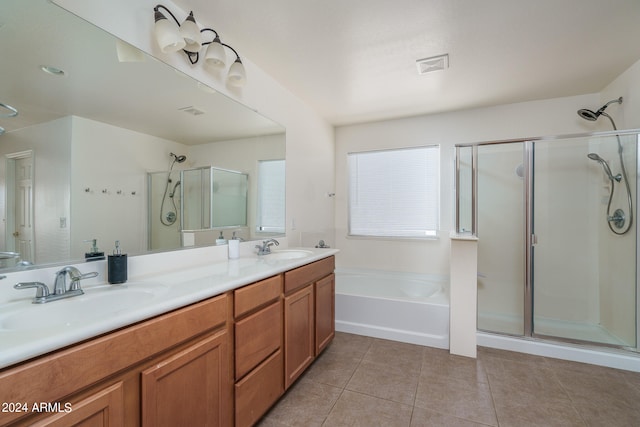 bathroom featuring vanity, separate shower and tub, and tile patterned floors