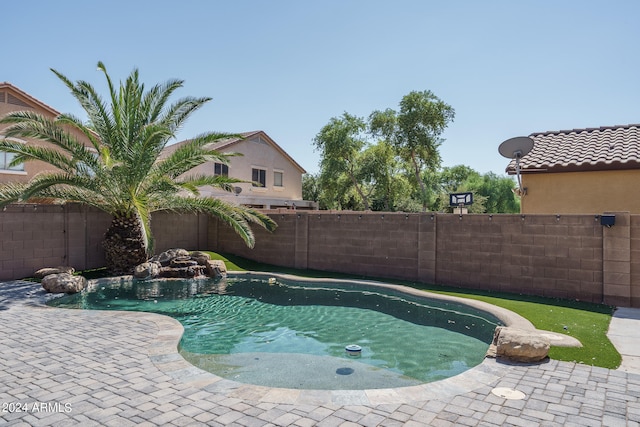 view of pool with a patio