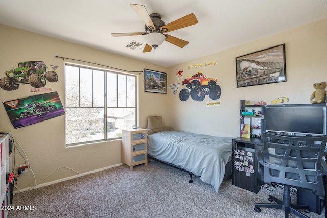 carpeted bedroom featuring ceiling fan