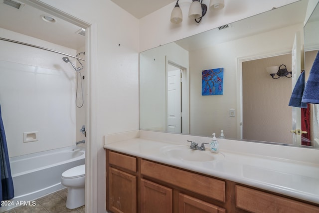 full bathroom featuring vanity, shower / bath combination, toilet, and tile patterned floors