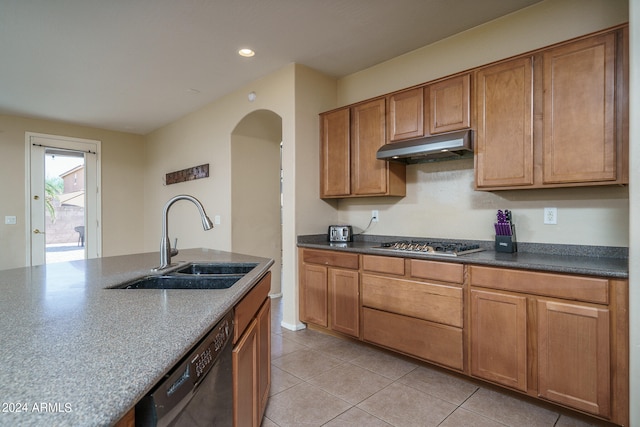 kitchen with light tile patterned floors, dishwasher, sink, and stainless steel gas cooktop